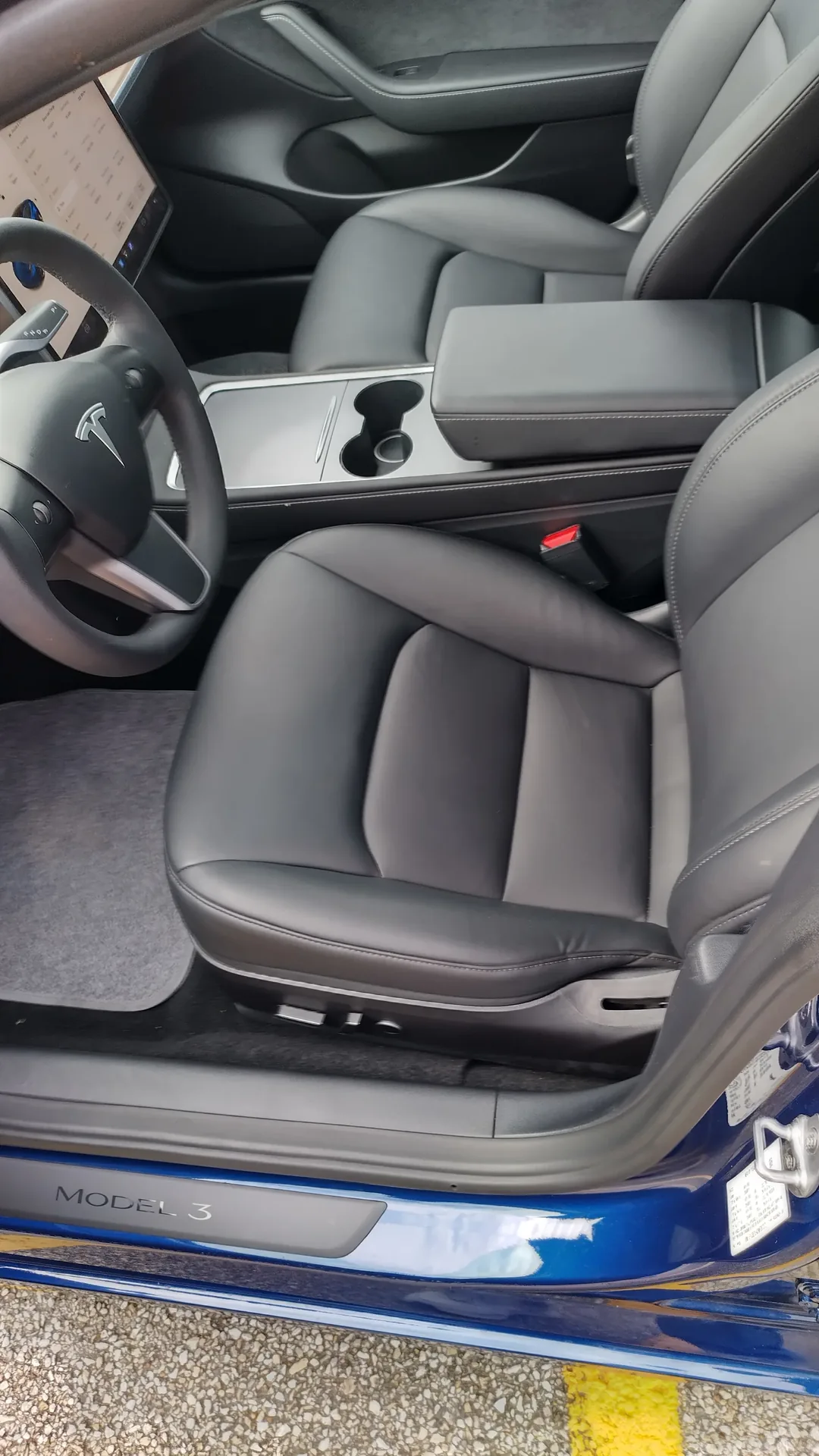 Front cabin and center console of the Tesla Model 3 sedan
